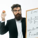 bearded-man-with-einstein-formula-newtons-law